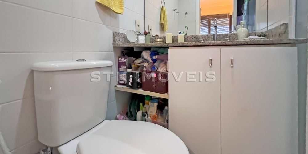 a bathroom with a toilet and sink